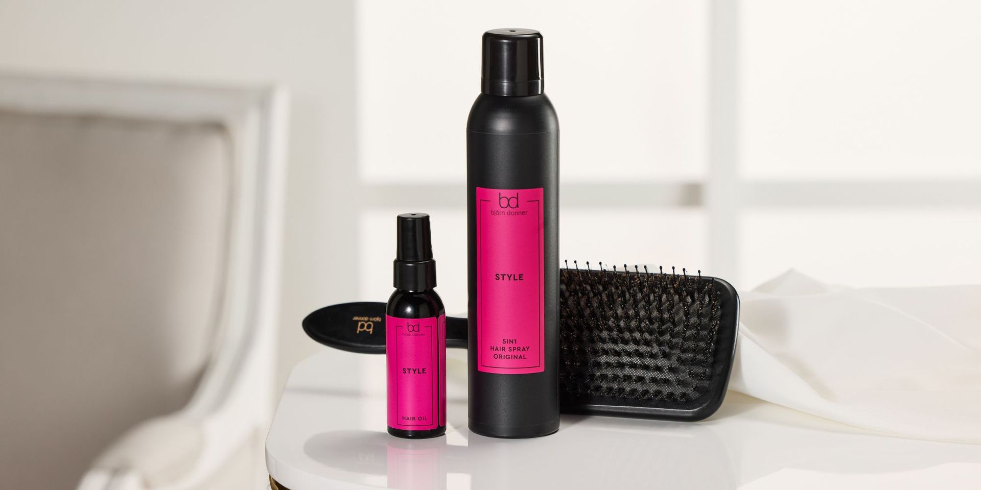 Ausgewählte Haarstylingprodukte von Björn Donner auf einem hellen Hintergrund