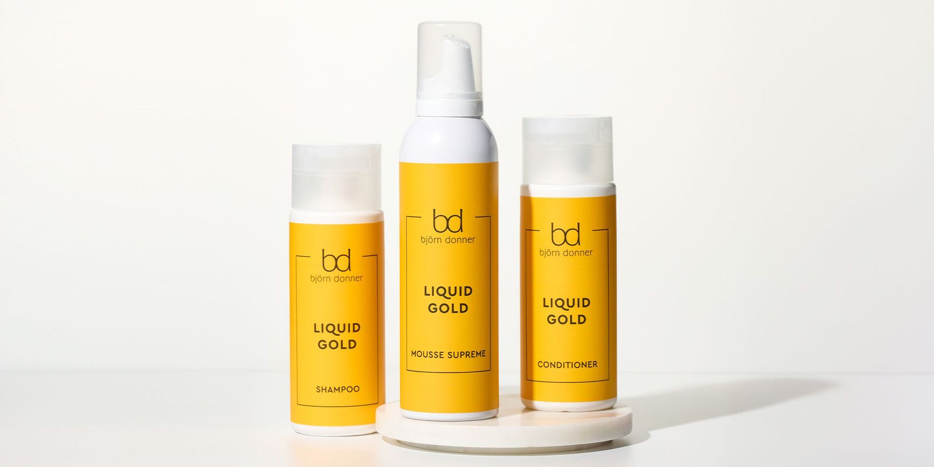 Drei Produkte aus der neuen Haarpflegelinie Liquid Gold