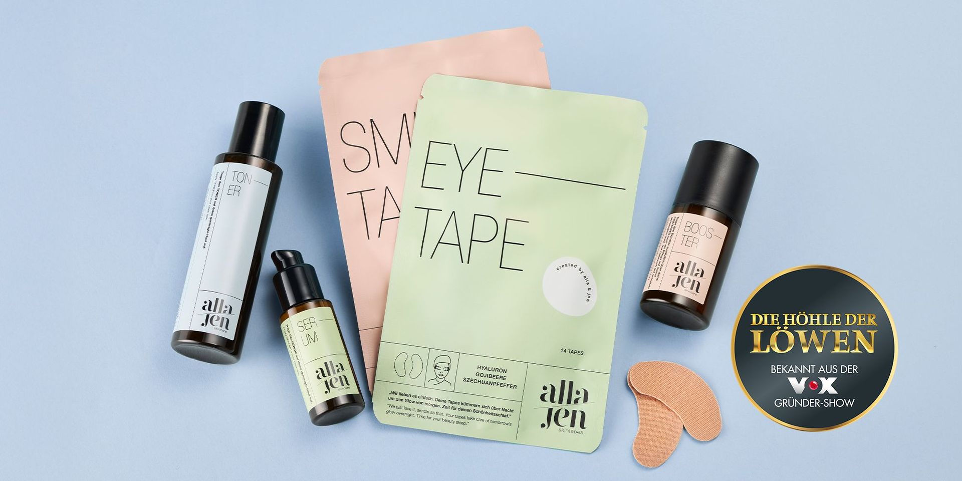 Hautpflegeprodukte von alla jen mit Toner, Serum, Booster und Eye Tape sowie Smile Tape auf blauem Hintergrund